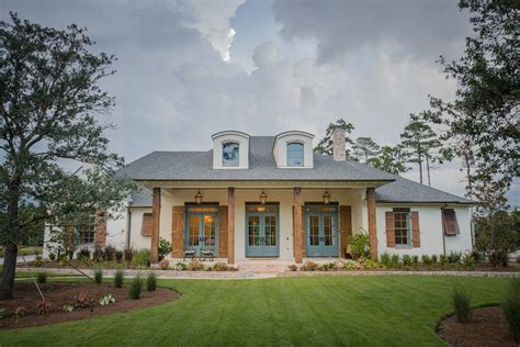 acadian style house with metal roof|what is an acadian house.